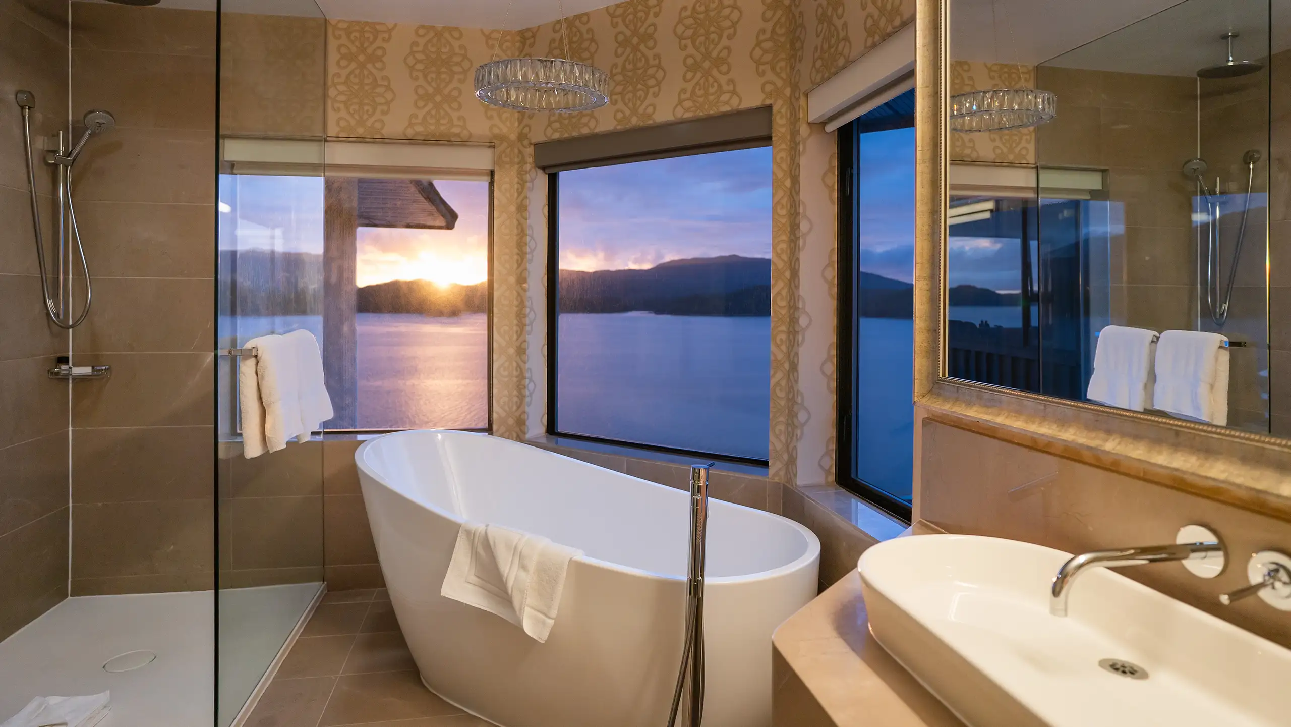 Suite sitting area and bedroom facing the water